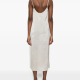 White dress worn by a person, showing the dress fit
