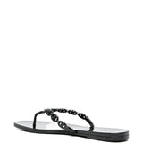 Black sandals, back view