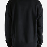 Black hoodies worn by a person, showing the hoodies fit