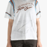 White T-shirt worn by a person, showing the T-shirt's fit