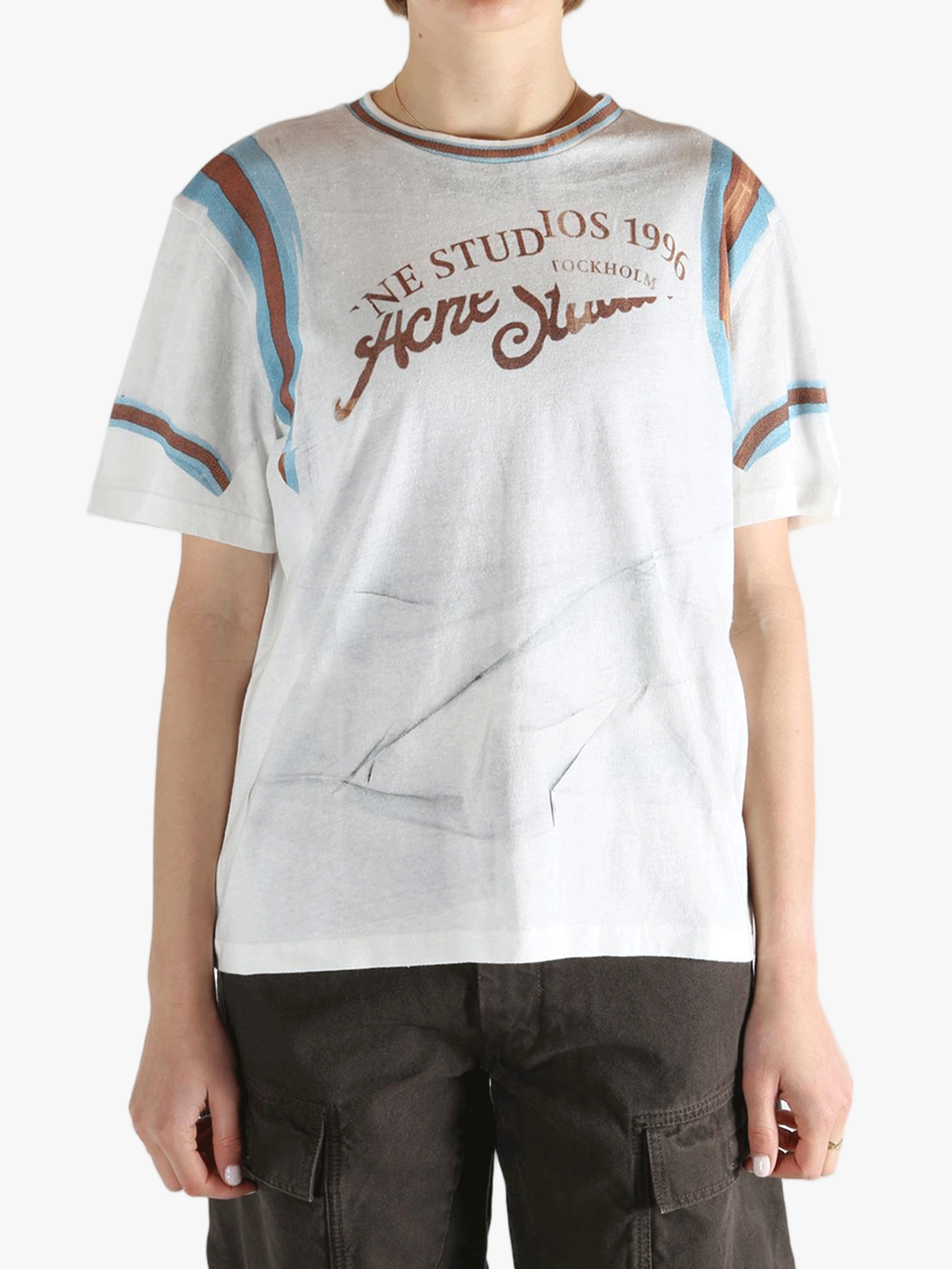 White T-shirt worn by a person, showing the T-shirt's fit