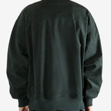 Grey jacket worn by a person, showing the jacket's fit