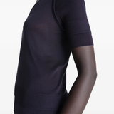 Close up of black top, showing texture of the viscose fabric