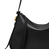 Close up of black bags, showing texture of the calf leather and polyamide and polyurethane fabric