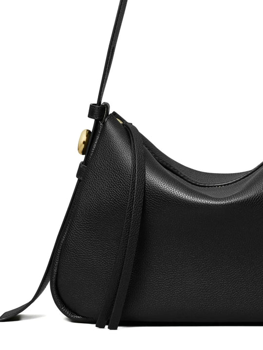 Close up of black bags, showing texture of the calf leather and polyamide and polyurethane fabric