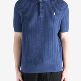 Navy t-shirt worn by a person, showing the shirt's fit