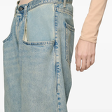Close up of blue jeans, showing texture of the blended fabric
