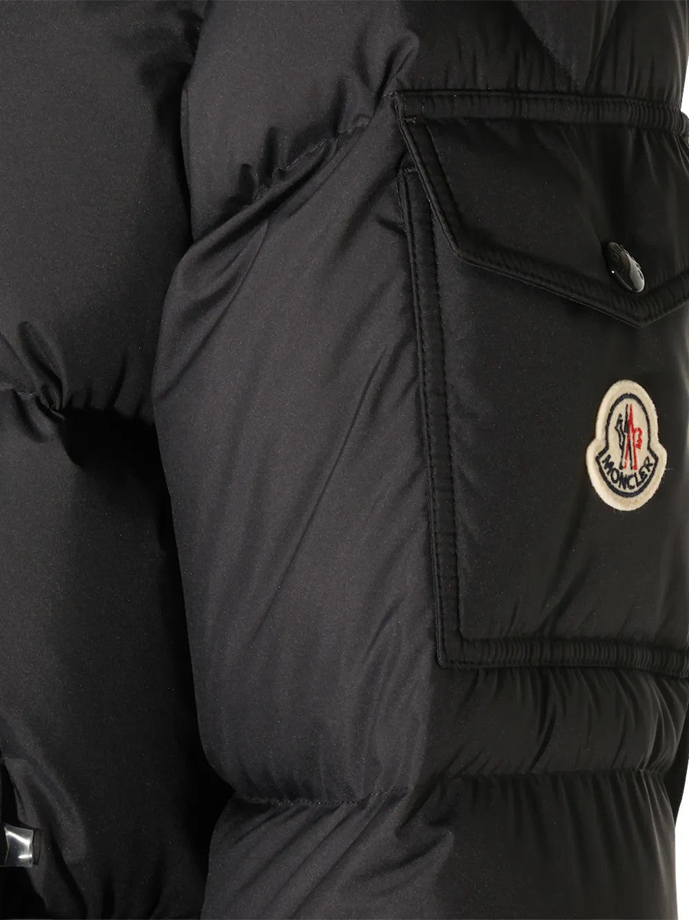 Close up of Black jacket, showing texture of the 100% polyester fabric