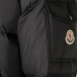 Close up of Black jacket, showing texture of the 100% polyester fabric