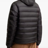 Black jacket worn by a person, showing the jacket fit