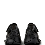 black sneakers, back view