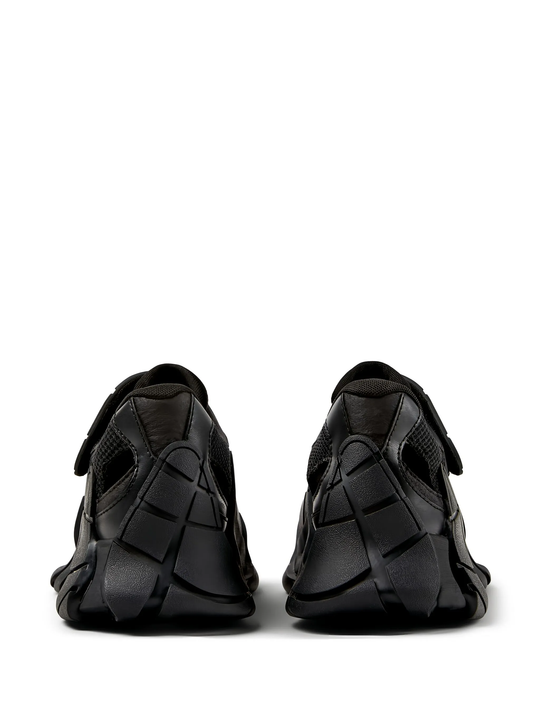 black sneakers, back view