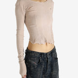 Tan top worn by a person, showing the top's fit