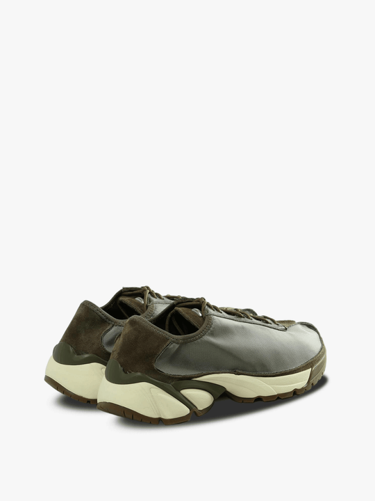 Green sneakers, side view