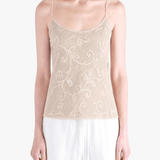 Tan top worn by a person, showing the top fit