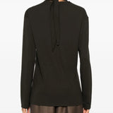 Brown top worn by a person, showing the top's fit