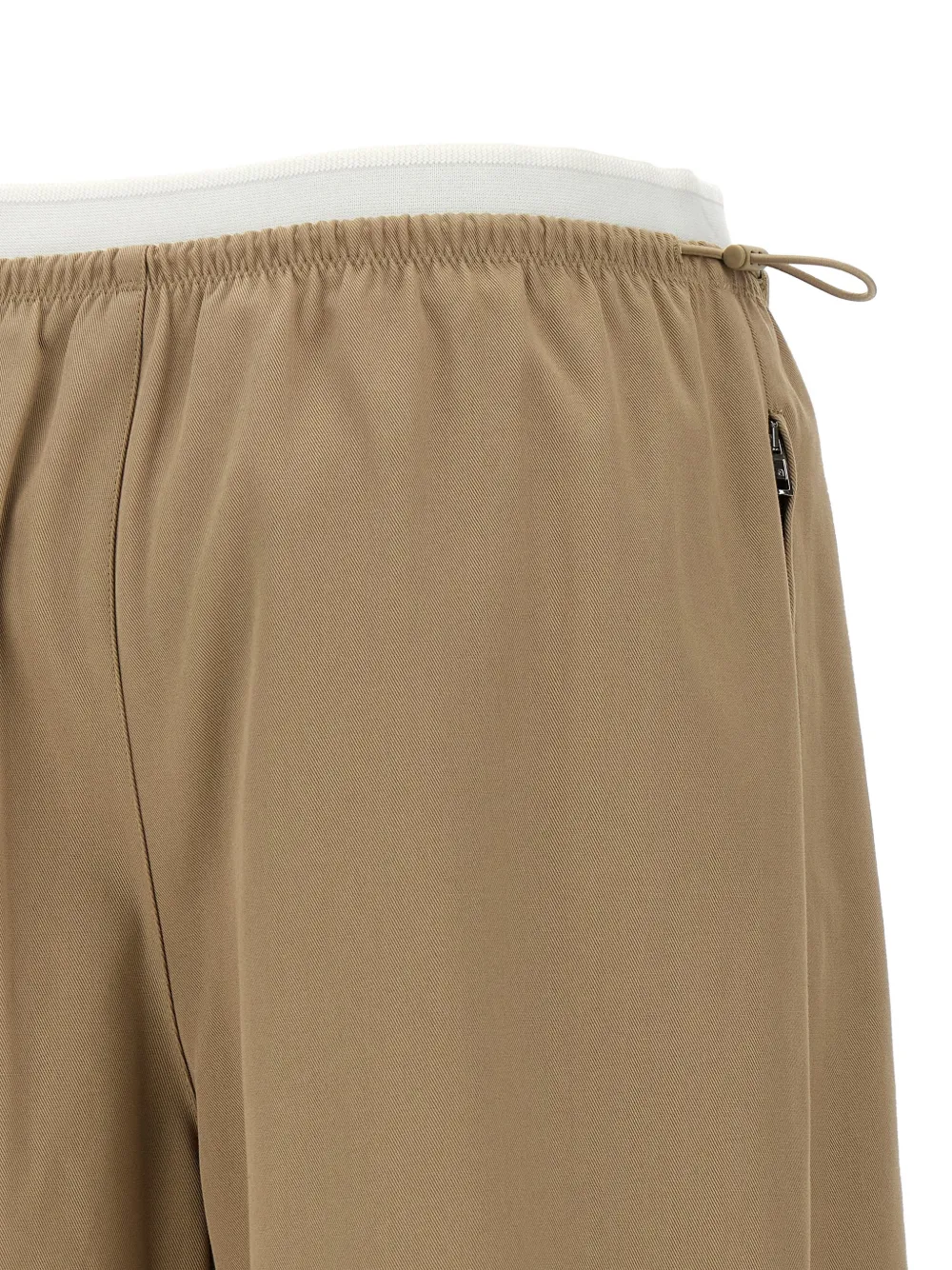 Close up of tan pants, showing texture of the Cotton fabric