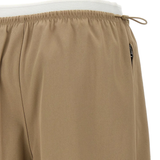 Close up of tan pants, showing texture of the Cotton fabric