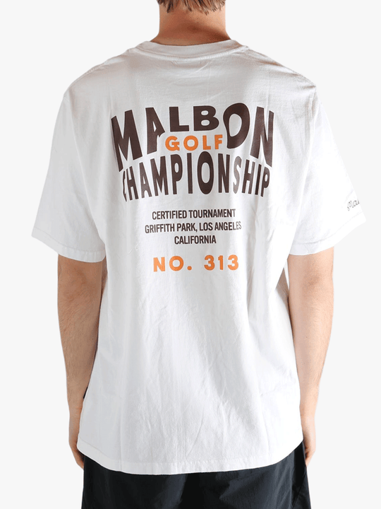 White t-shirt worn by a person, showing the t-shirt's fit