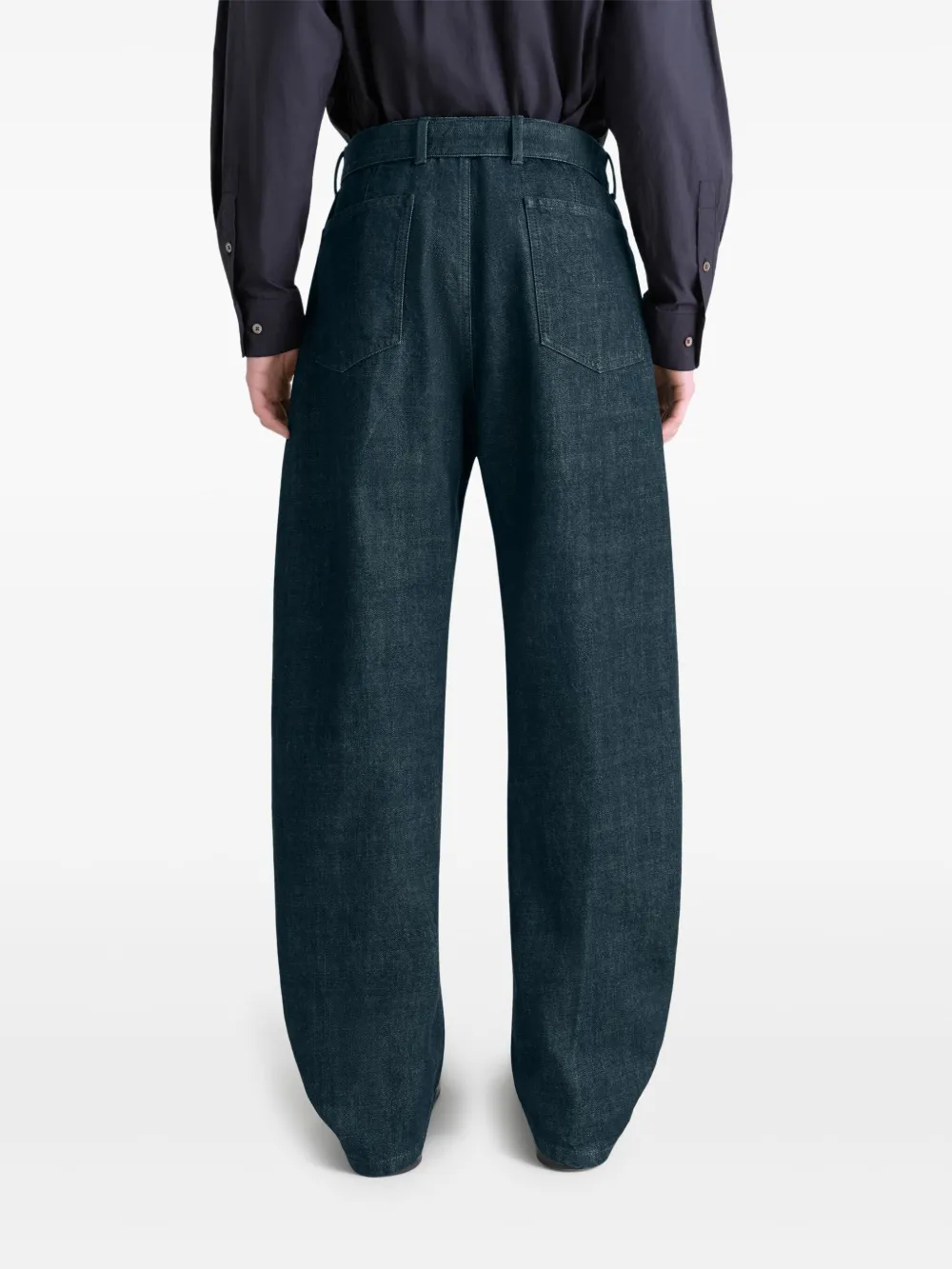 Navy pants worn by a person, showing the pants fit