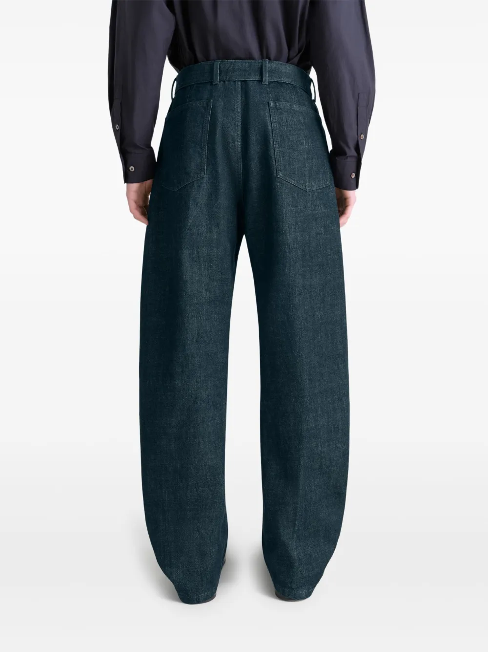 Navy pants worn by a person, showing the pants fit