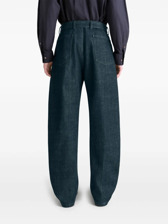 Navy pants worn by a person, showing the pants fit