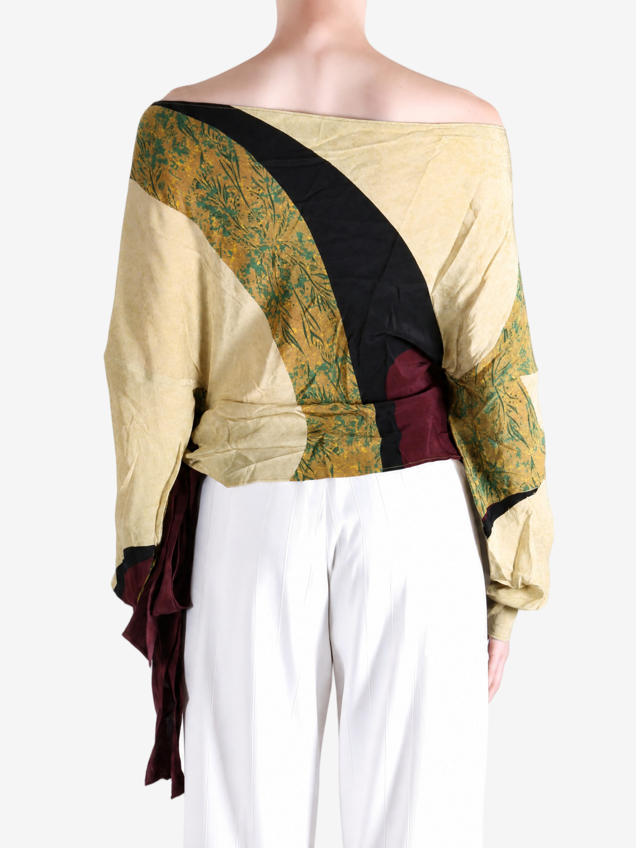Yellow top worn by a person, showing the top fit