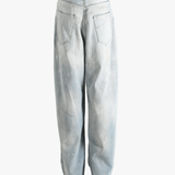 Blue jeans worn by a person, showing the jeans's fit