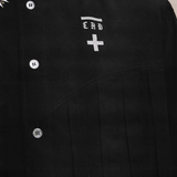 Close up of Black shirt, showing texture of the 100% cotton fabric