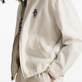 White coat worn by a person, showing the  coat's fit