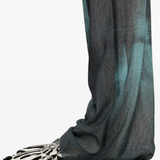 Close up of the blue pants, showing texture of the polyamide fabric