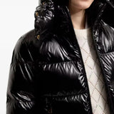 Black jacket worn by a person, showing the jacket fit