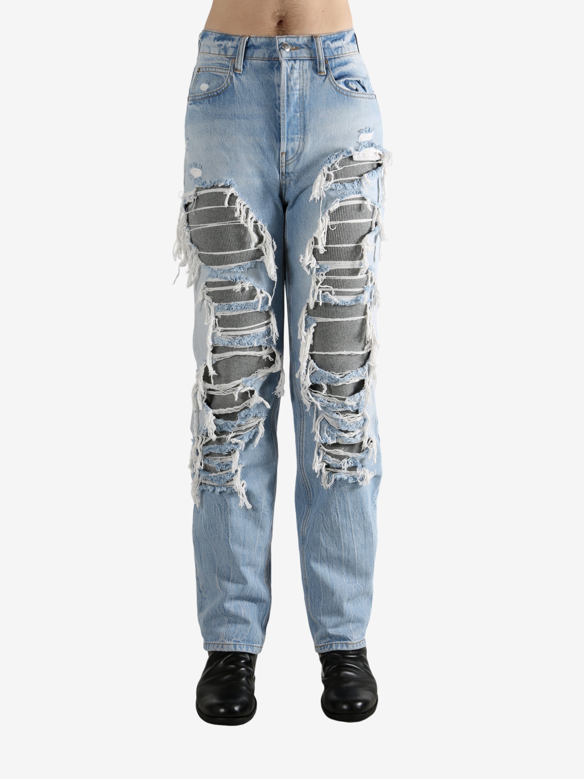 Blue jeans worn by a person, showing the jeans fit