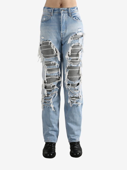 Blue jeans worn by a person, showing the jeans fit