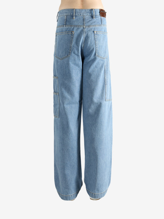 Blue jeans worn by a person, showing the jeans' fit