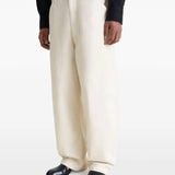 Black boot worn by a person, showing the boot's fit