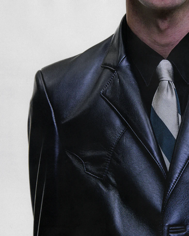 Black jacket worn by a person, showing the jacket fit