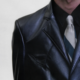 Black jacket worn by a person, showing the jacket fit