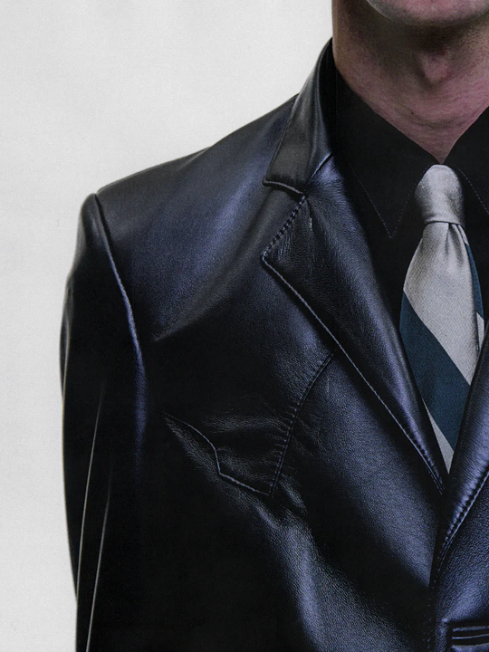 Black jacket worn by a person, showing the jacket fit
