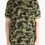 Green shirt worn by a person, showing the shit fit