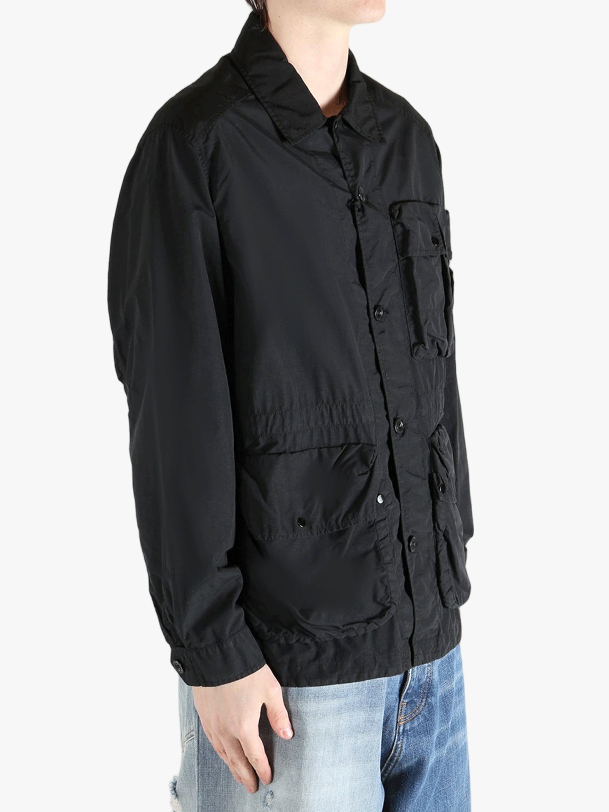 Black jacket worn by a person, showing the jacket fit