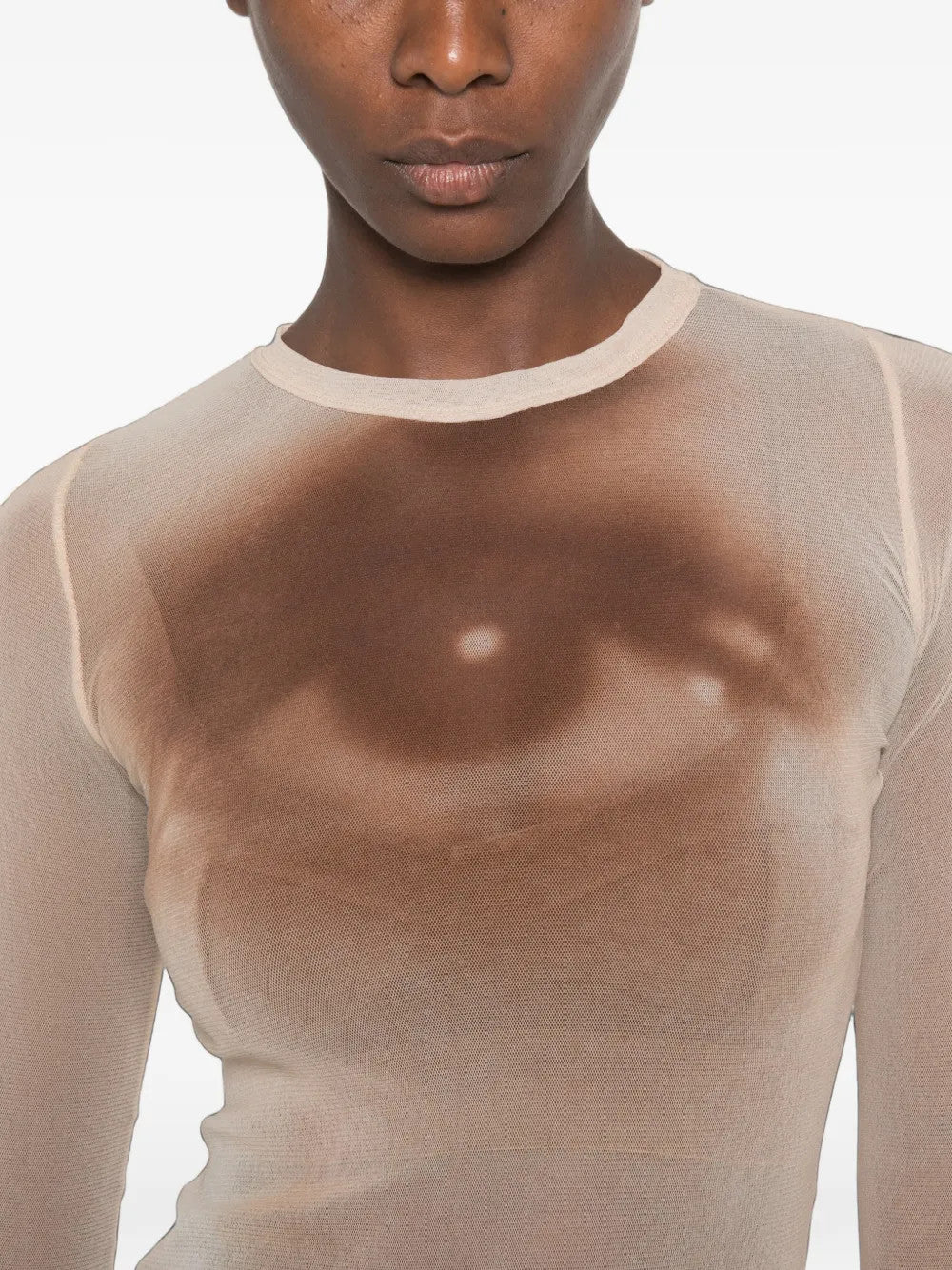 Tan top worn by a person, showing the top fit