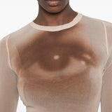 Tan top worn by a person, showing the top fit