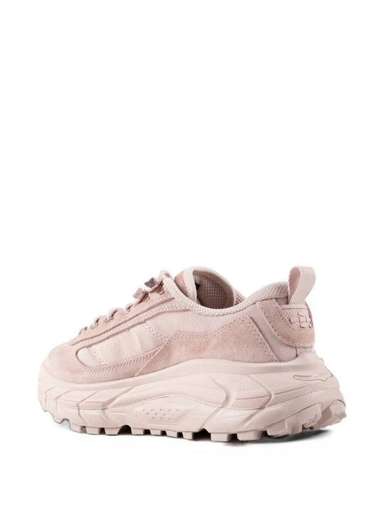 Pink shoes, side view