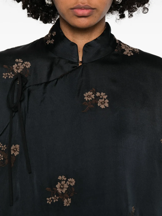 Close up of black jackets, showing texture of the fabric
