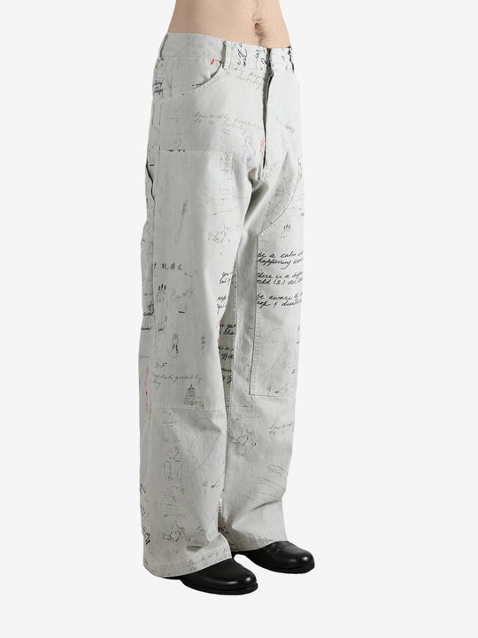 Grey pant worn by a person, showing the pant's fit