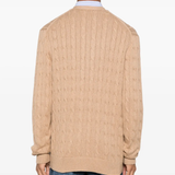 Tan cardigan worn by a person, showing the cardigan fit
