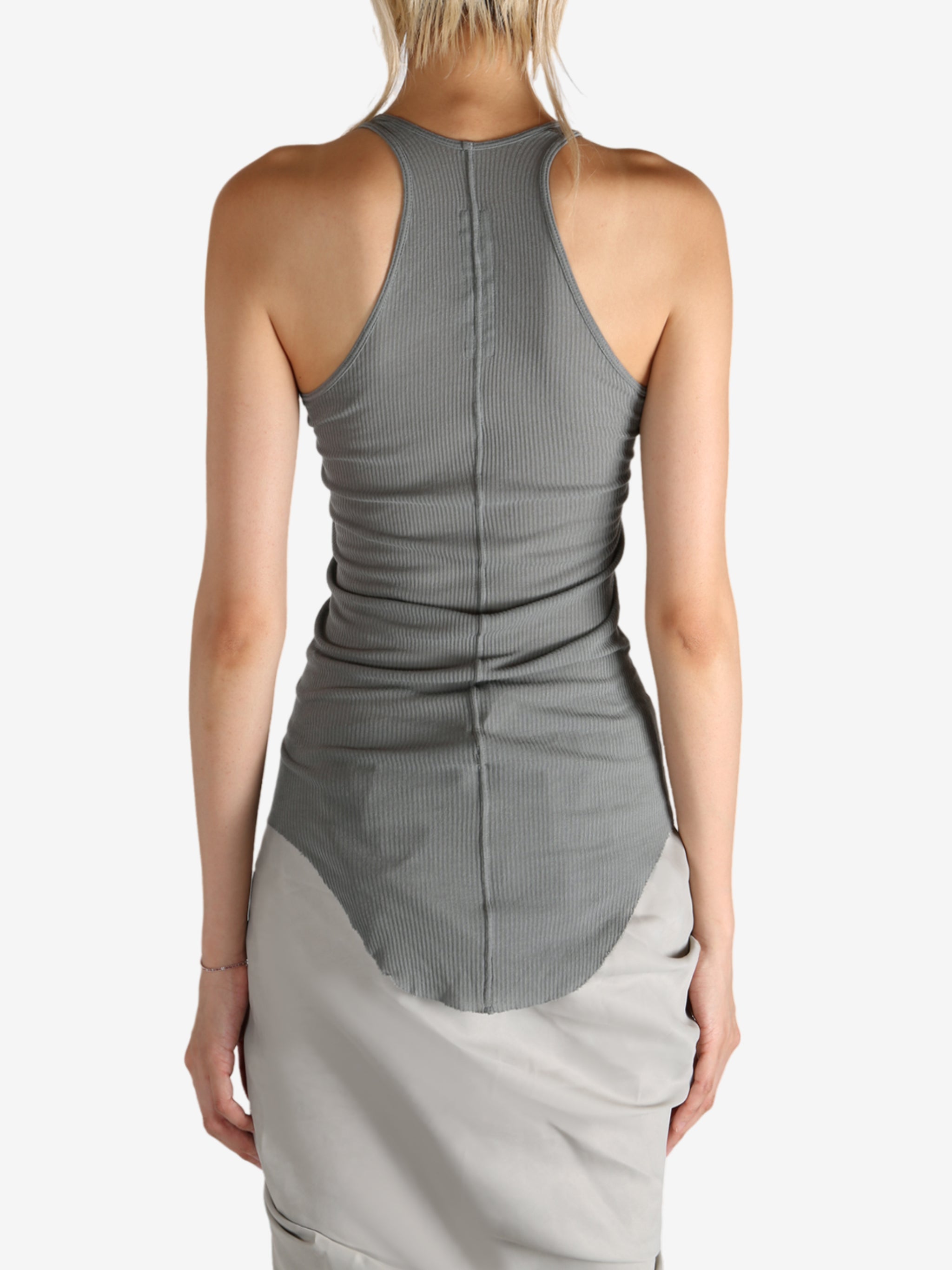 Grey top worn by a person, showing the top's fit