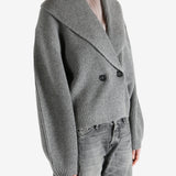  gray sweater  worn by a person, showing the sweater fit