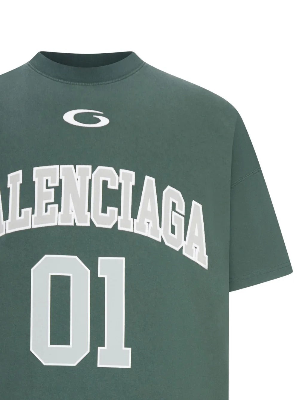 Close up of green t-shirt, showing texture of the cotton fabric